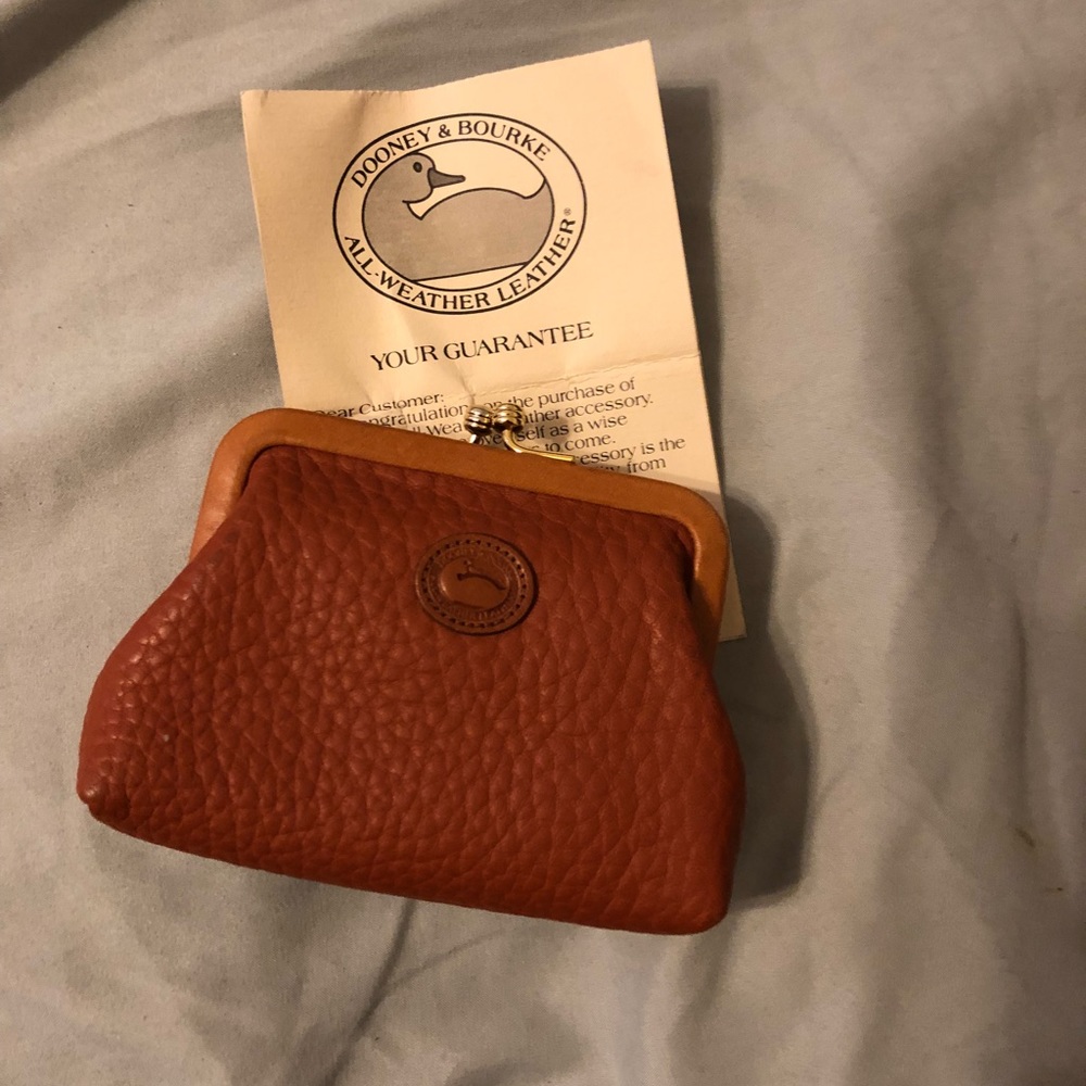 Dooney all weather leather coin purse.